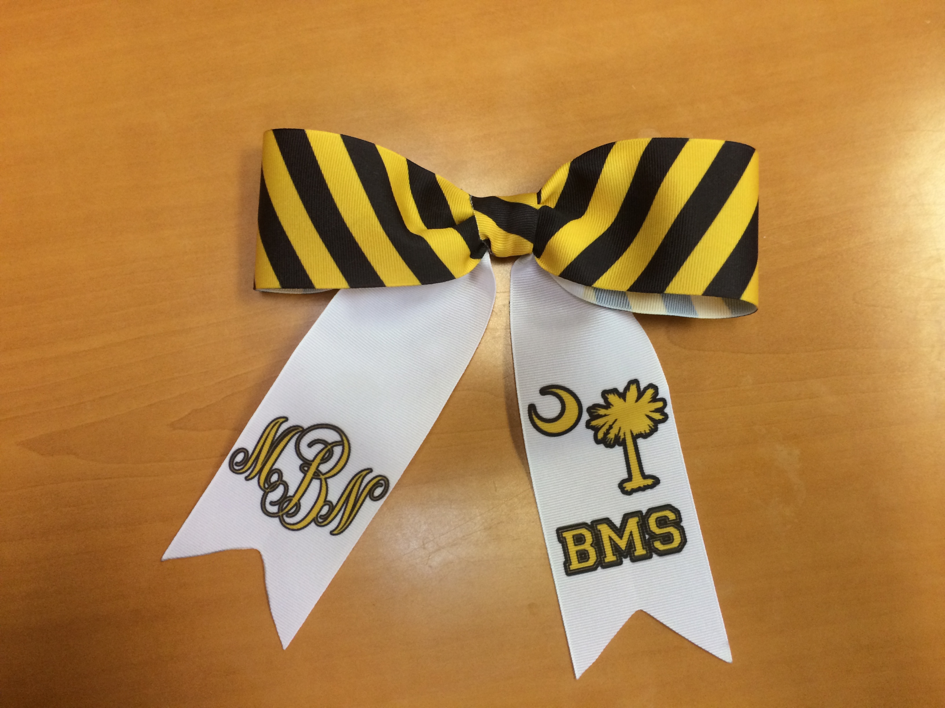 Yellow and Black Cheerbow made with sublimation printing