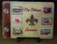 Made to look like an aged scrapbook with New Orleans vintage stamp pictures.