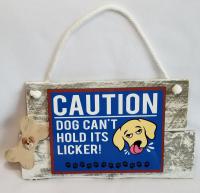 A cute wall or door hanging warning guests that this dog loves to lick!