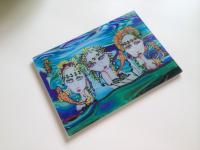 My Painted Lady art work sublimated onto the glass cutting boards.