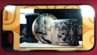 This cell phone case was made for a drum maker.   The photograph is 3 of the drums he made and 