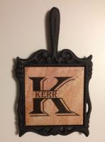 Iron Trivet with initial and last name.