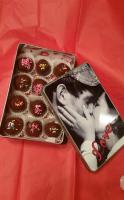 Image imprinted on tin with valentine treats inside!